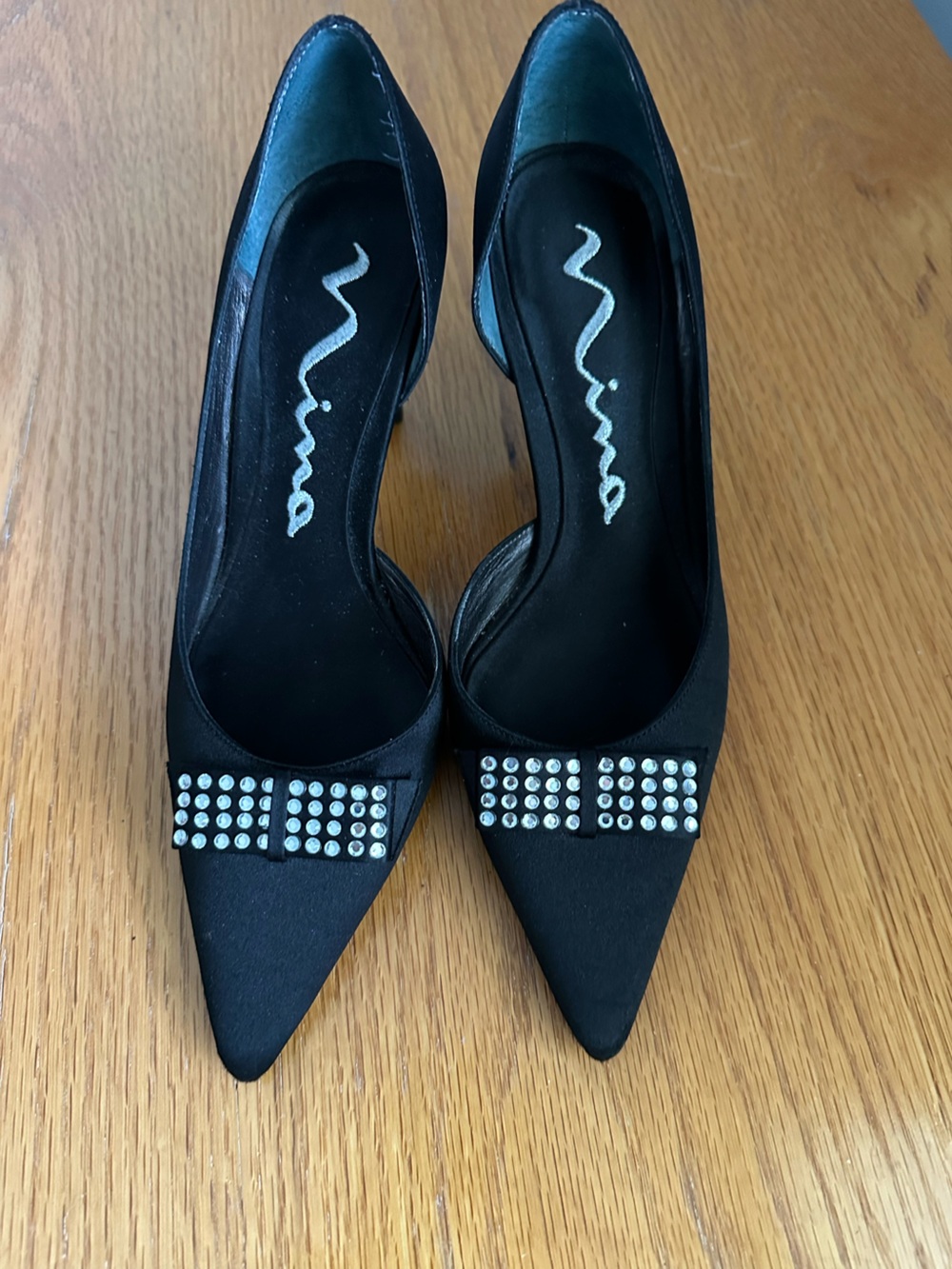 Nina Black Pointed-Toe Pumps with Crystal Bow Accent
